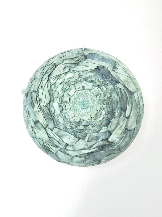 Green hand dyed woven circular wall art