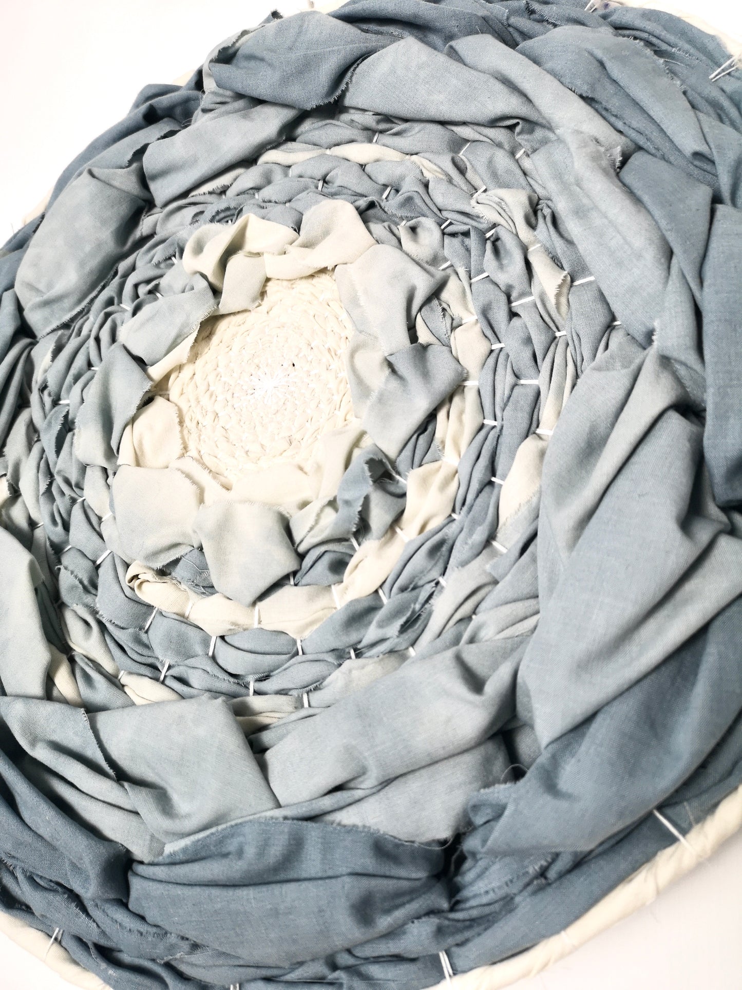 Blue dip dyed circular woven wall art