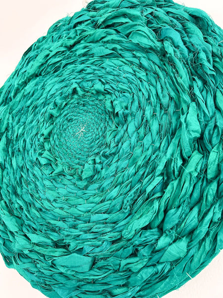 Vibrant green silk circular weaving