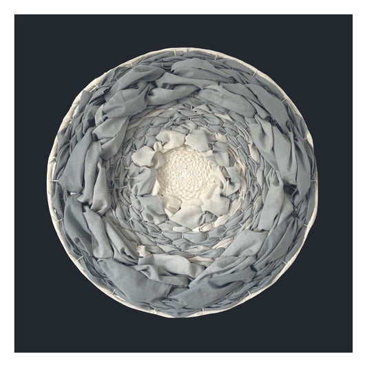 Blue dip dyed circular woven wall art