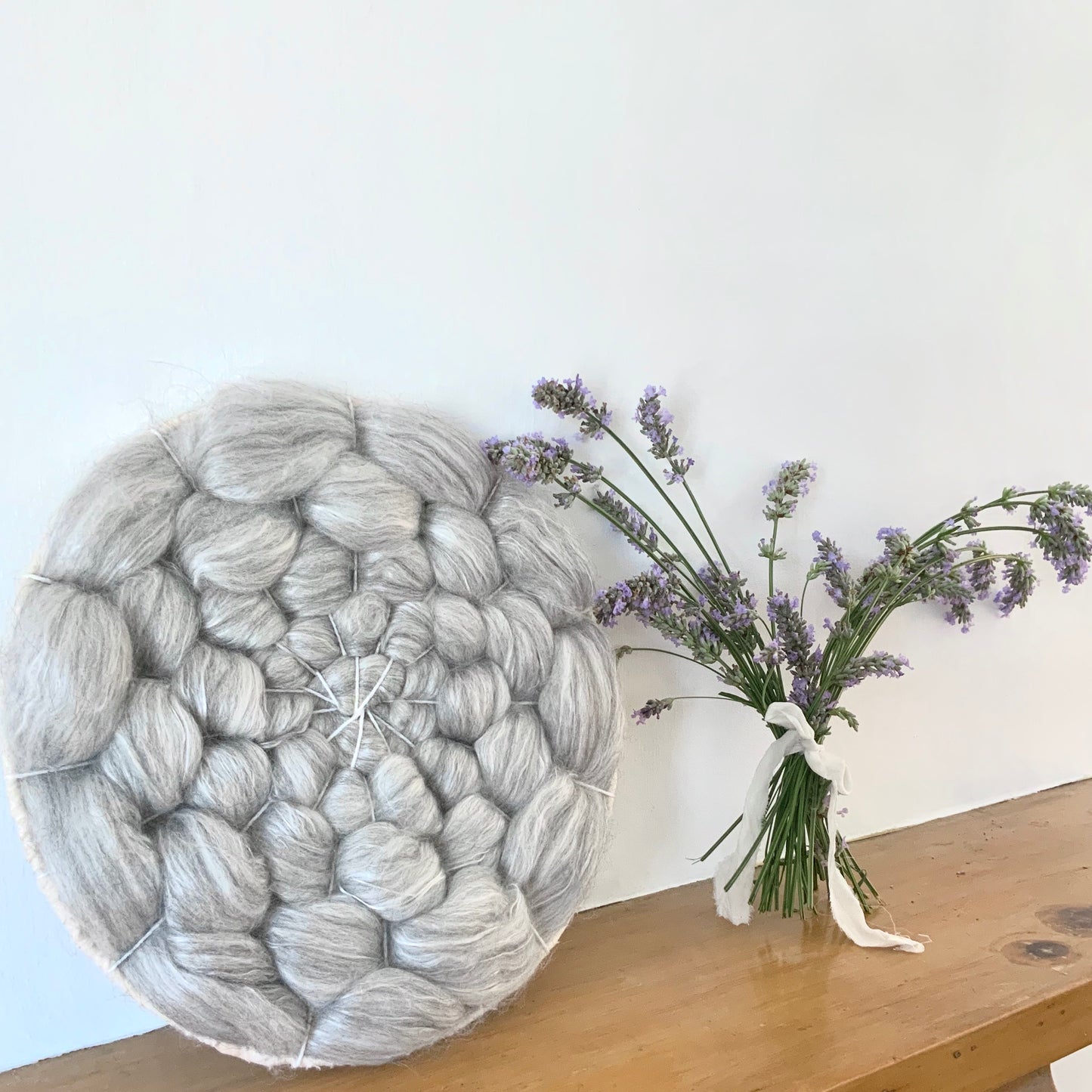 Light grey circular weaving