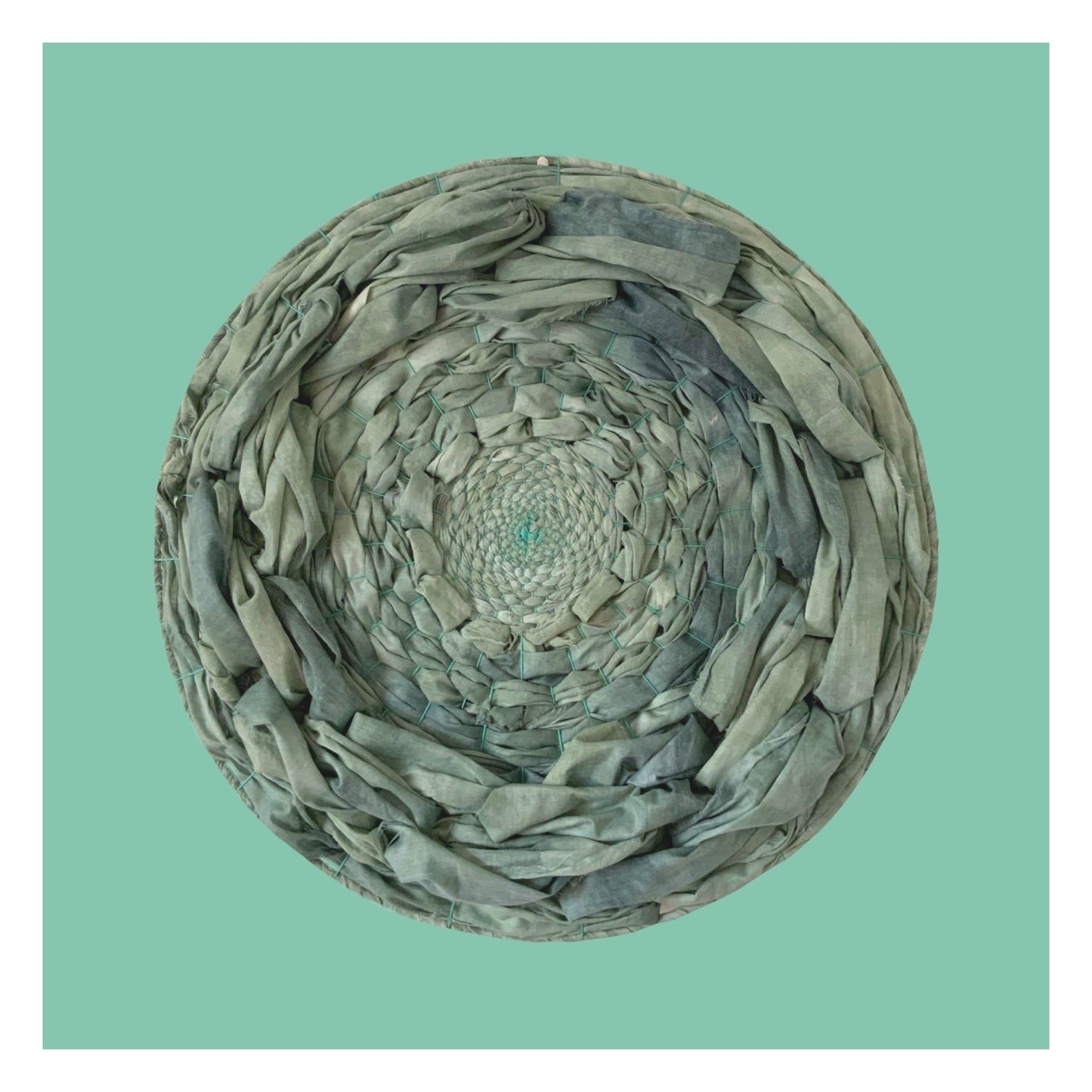 Green hand dyed woven circular wall art