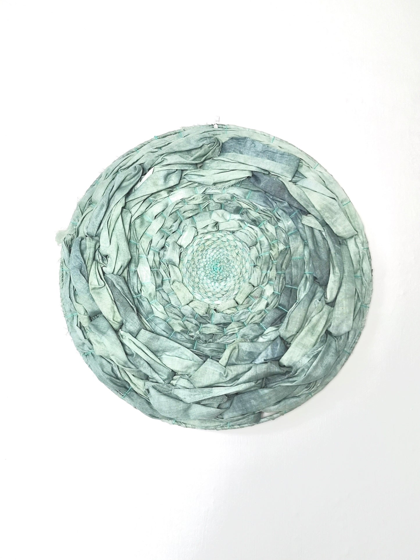 Green hand dyed woven circular wall art