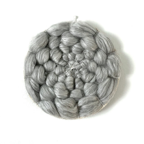 Light grey circular weaving